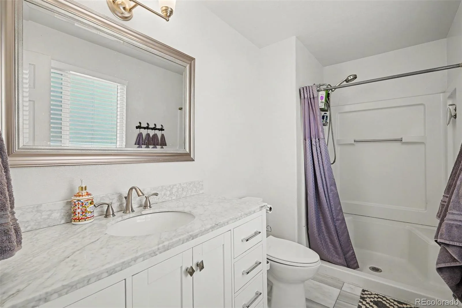 8143 S Otis Court Littleton CO 80128 | MLS #REC5515930 07022026234218 1600 25