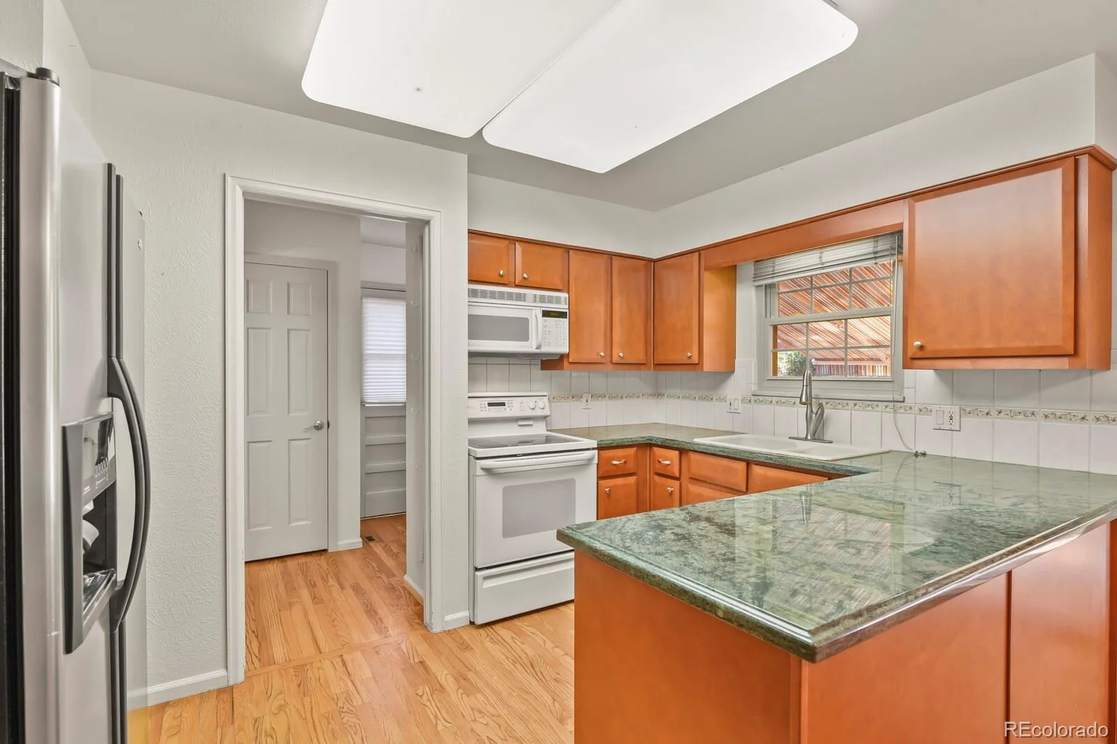 12506 E Vassar Drive Aurora CO 80014 | MLS #REC5584377 09232026185935 1600 2