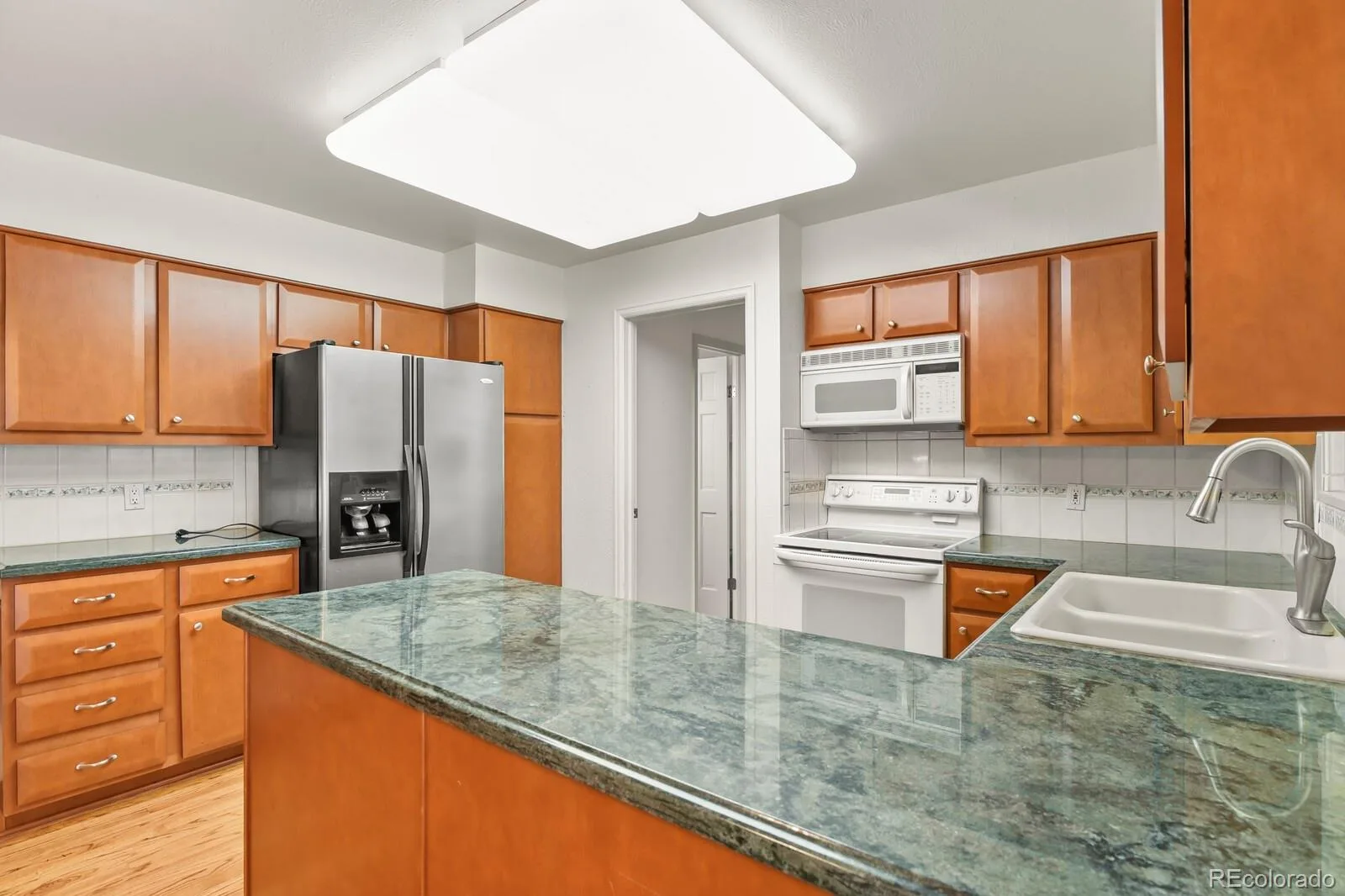 12506 E Vassar Drive Aurora CO 80014 | MLS #REC5584377 09232026185935 1600 3