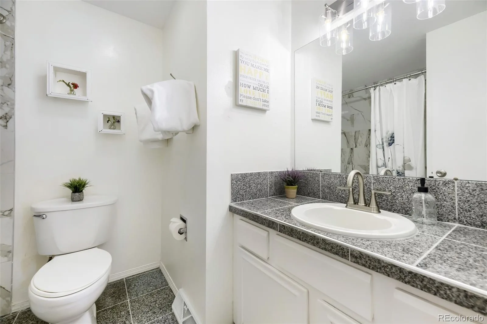 7533 W Ottawa Place Littleton CO 80128 | MLS #REC5646564 08162026233949 1600 15