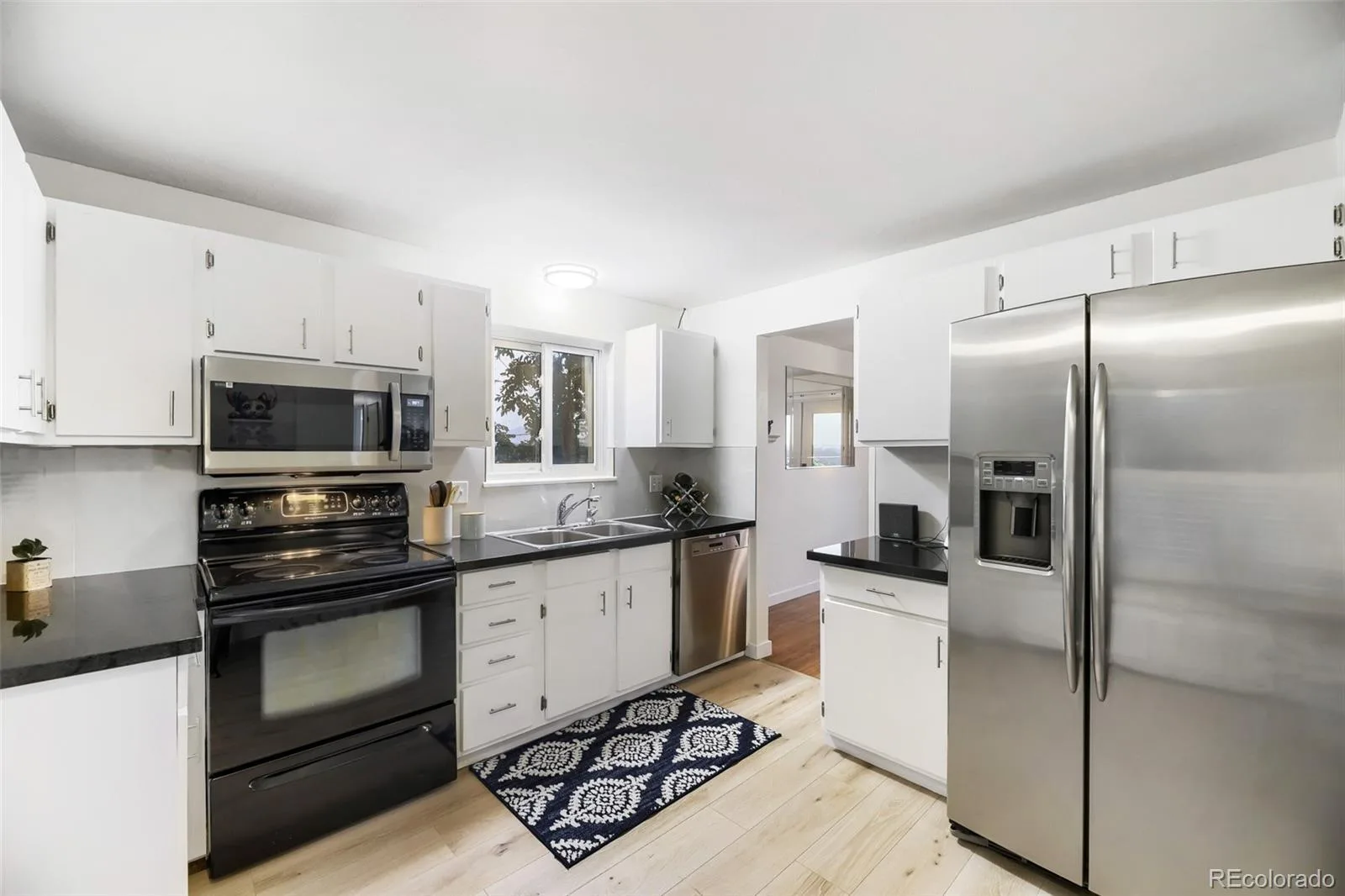 7533 W Ottawa Place Littleton CO 80128 | MLS #REC5646564 08162026233949 1600 8