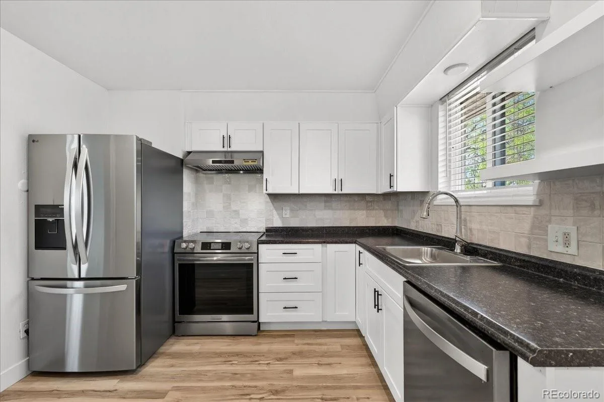 9030 Elm Court Denver CO 80260 | MLS #REC5690882 07152026214446 1200 12