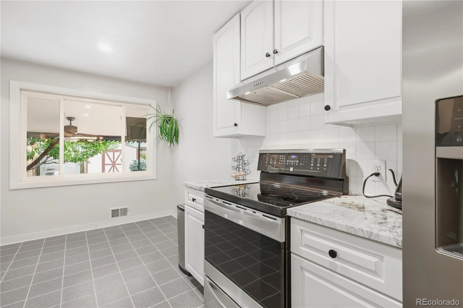 1990 S Stuart Street Denver CO 80219 | MLS #REC5711627 09212026195349 1600 15