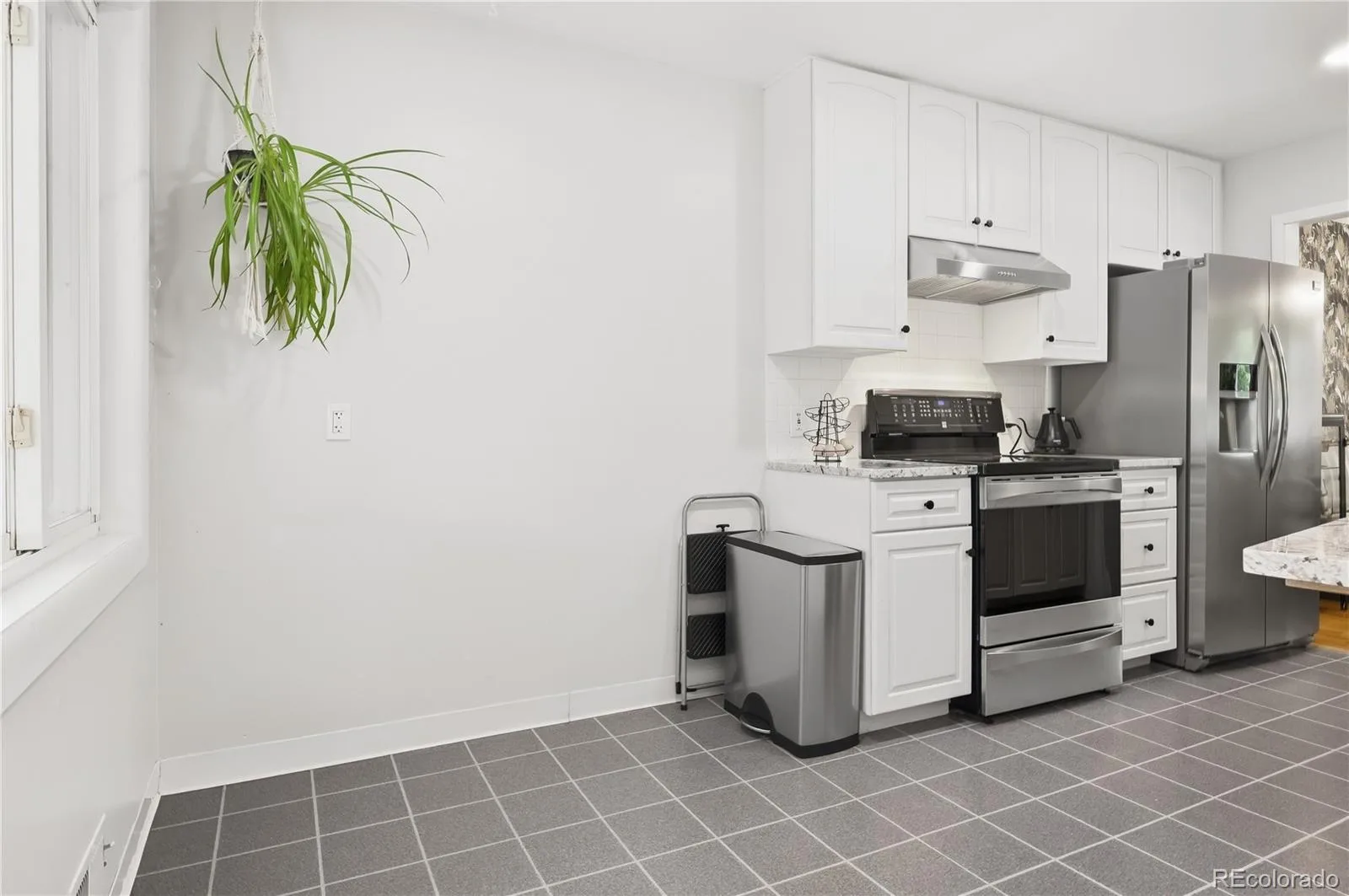 1990 S Stuart Street Denver CO 80219 | MLS #REC5711627 09212026195349 1600 16