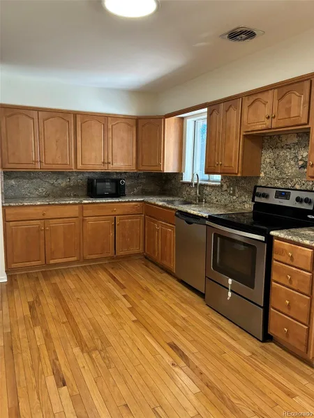 3091 S Yates Street Denver CO 80236 | MLS #REC5776219 07192026183616 800 10