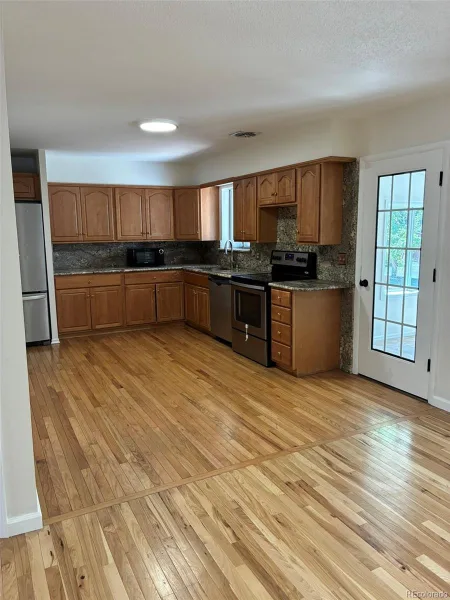 3091 S Yates Street Denver CO 80236 | MLS #REC5776219 07192026183616 800 8
