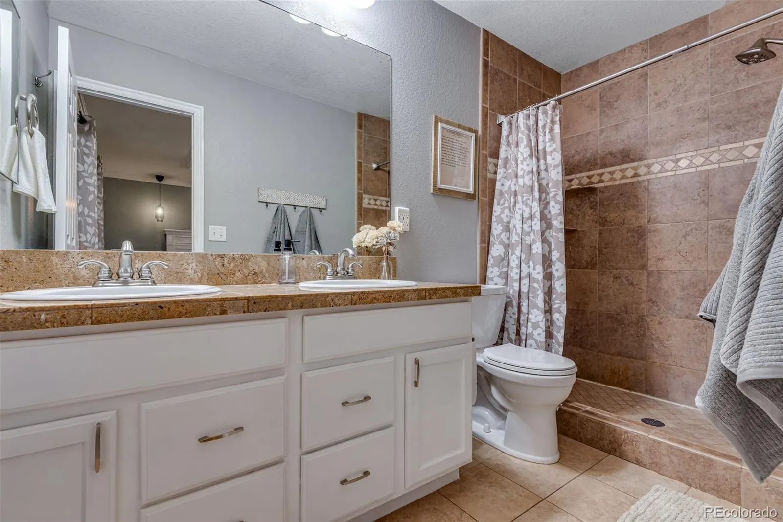 1179 S Alton Court Denver CO 80247 MLS #REC5902380 05012026032324 1600 16