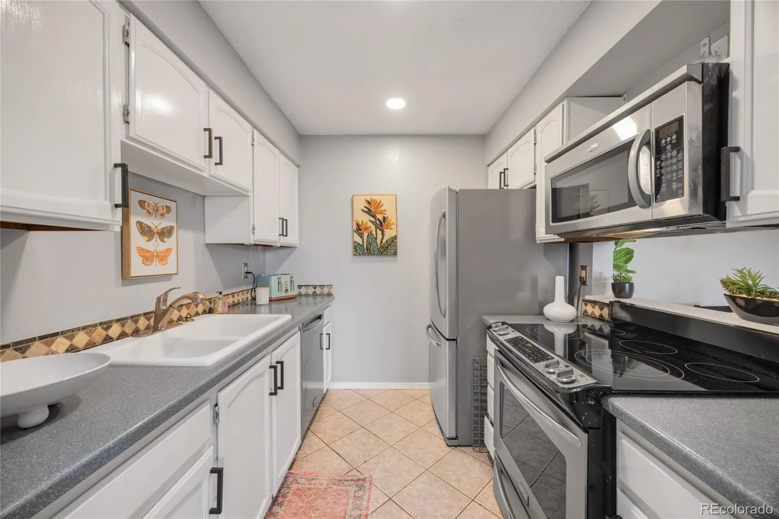 14469 E 1st Drive #A12 Aurora CO 80011 MLS #REC5959673 05272026040841 1600 3