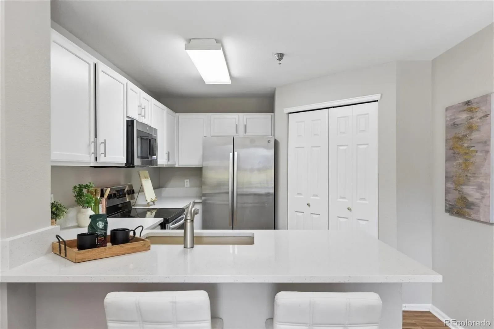 2575 S SYRACUSE Way #F101 Denver CO 80231 MLS #REC5966433 03202026150444 1600 7