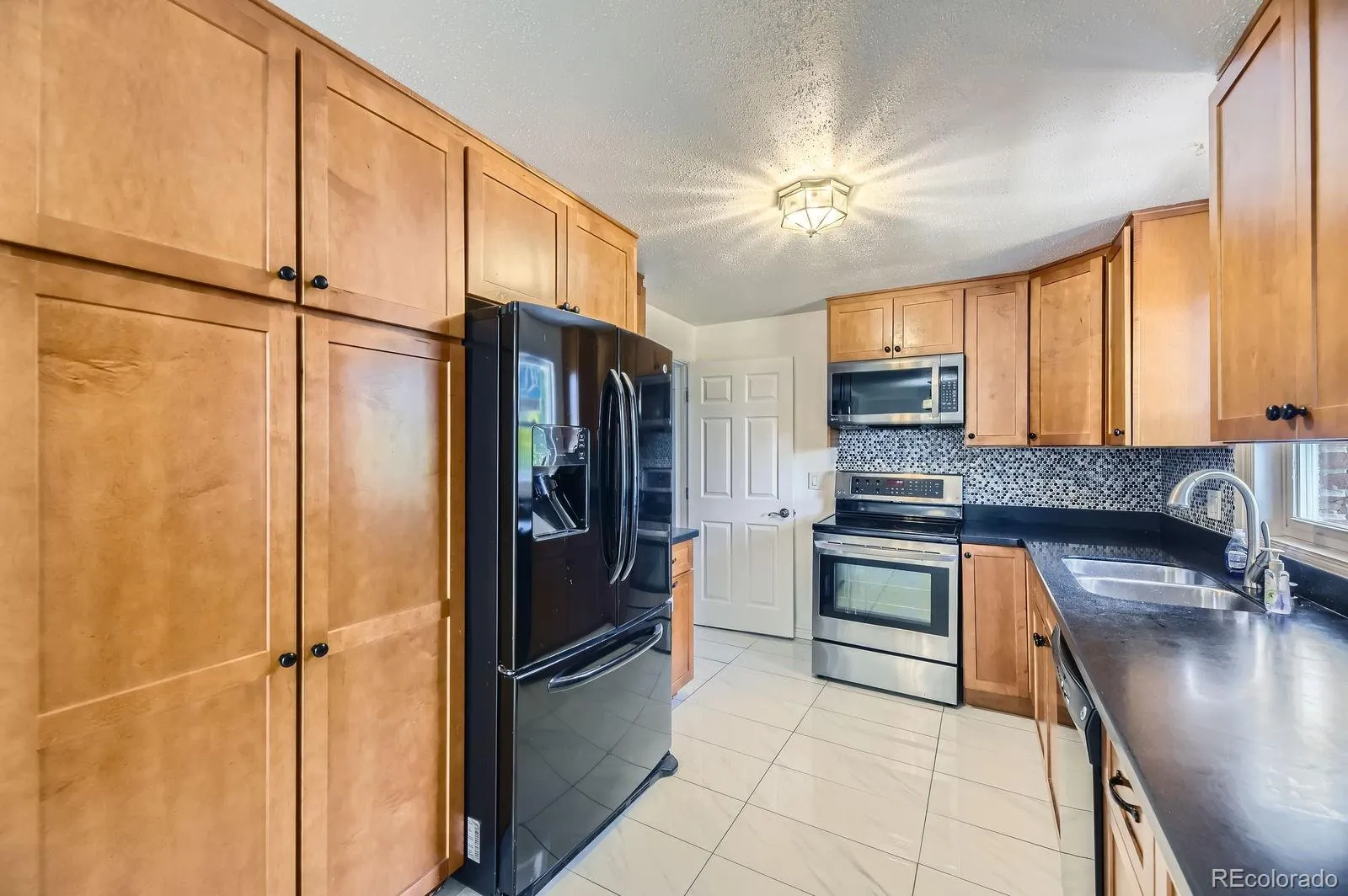 10633 E 6th Place Aurora CO 80010 MLS #REC6023443 05072026021021 1600 8