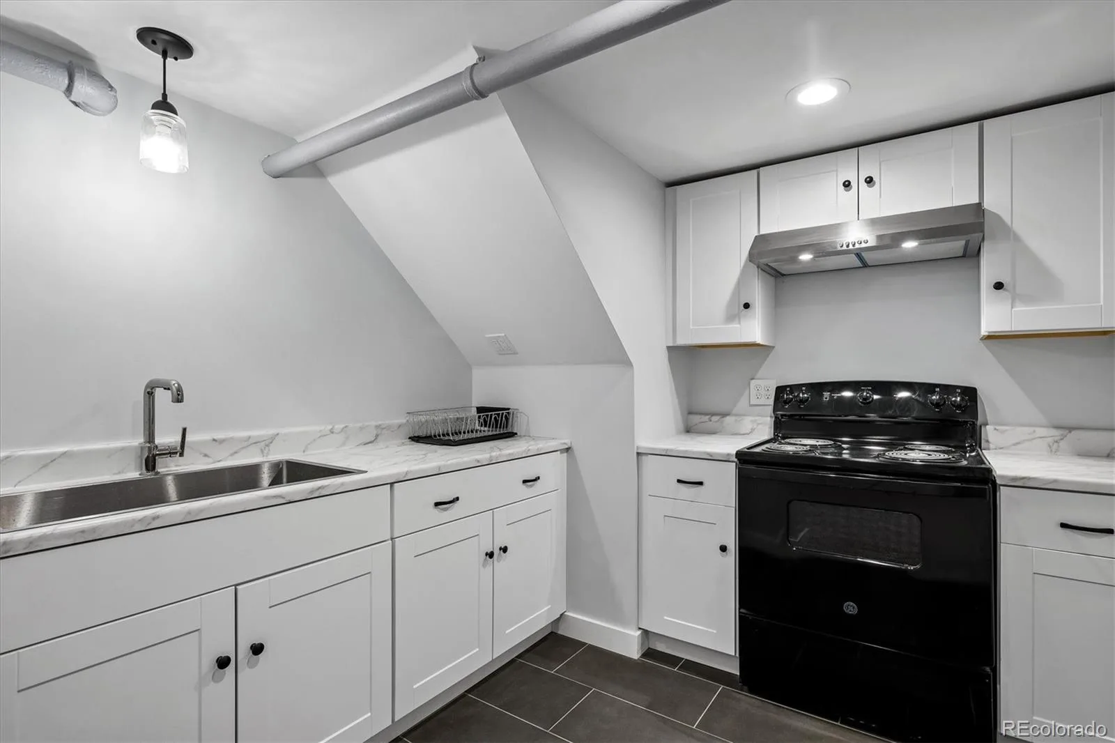1140 N Emerson Street Denver CO 80218 MLS #REC6024603 06092026015937 1600 27