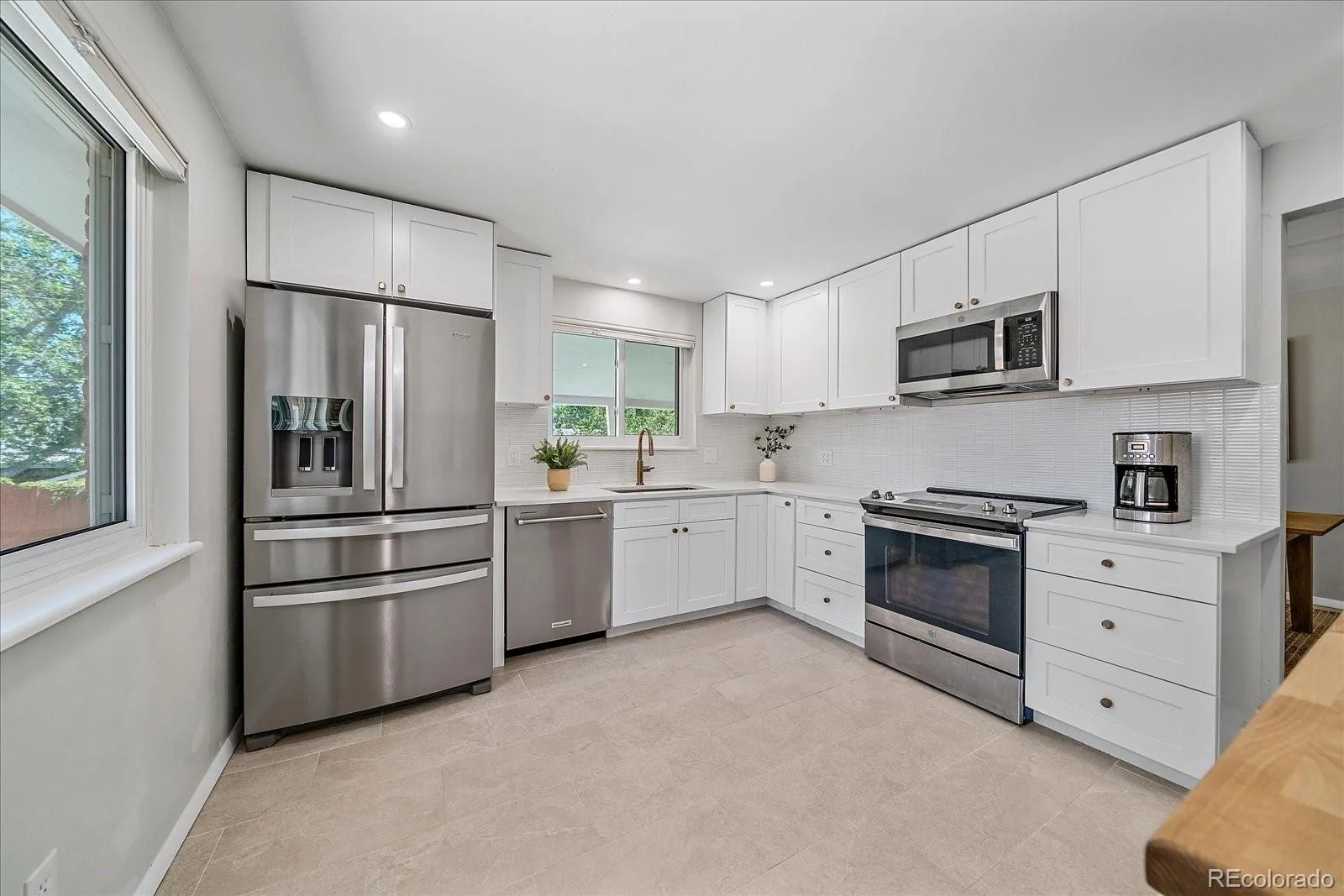 1344 S Dover Way Lakewood CO 80232 | MLS #REC6149294 08212026012353 1600 8