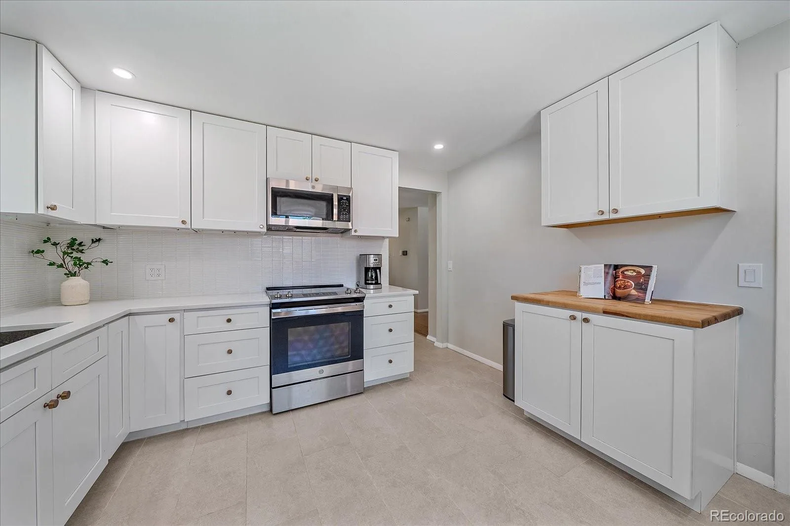 1344 S Dover Way Lakewood CO 80232 | MLS #REC6149294 08212026012353 1600 9