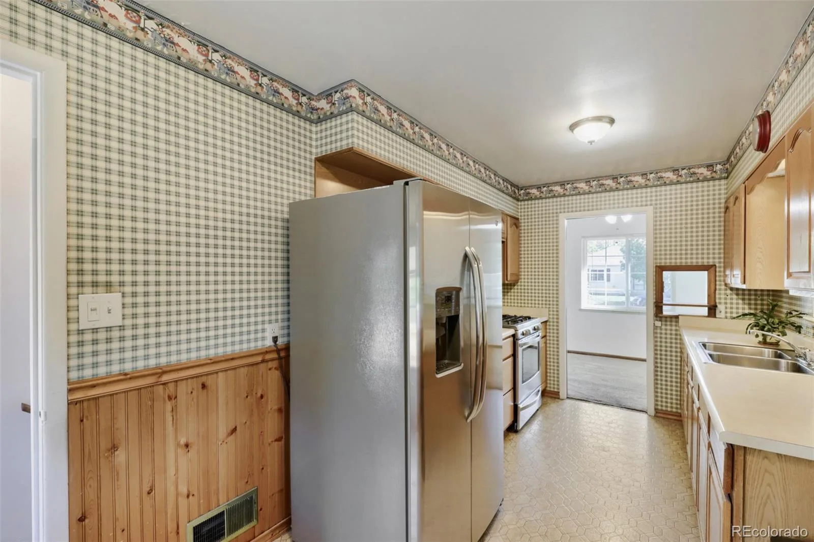 1051 Macon Street Aurora CO 80010 | MLS #REC6258627 09222026120432 1600 14