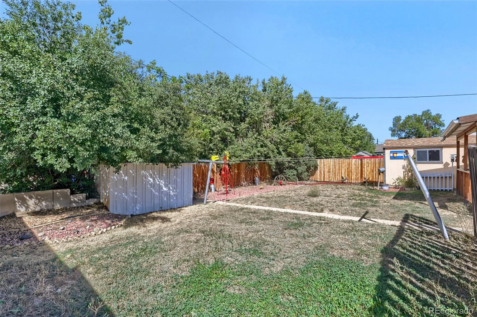 1051 Macon Street Aurora CO 80010 | MLS #REC6258627 09222026120432 1600 31
