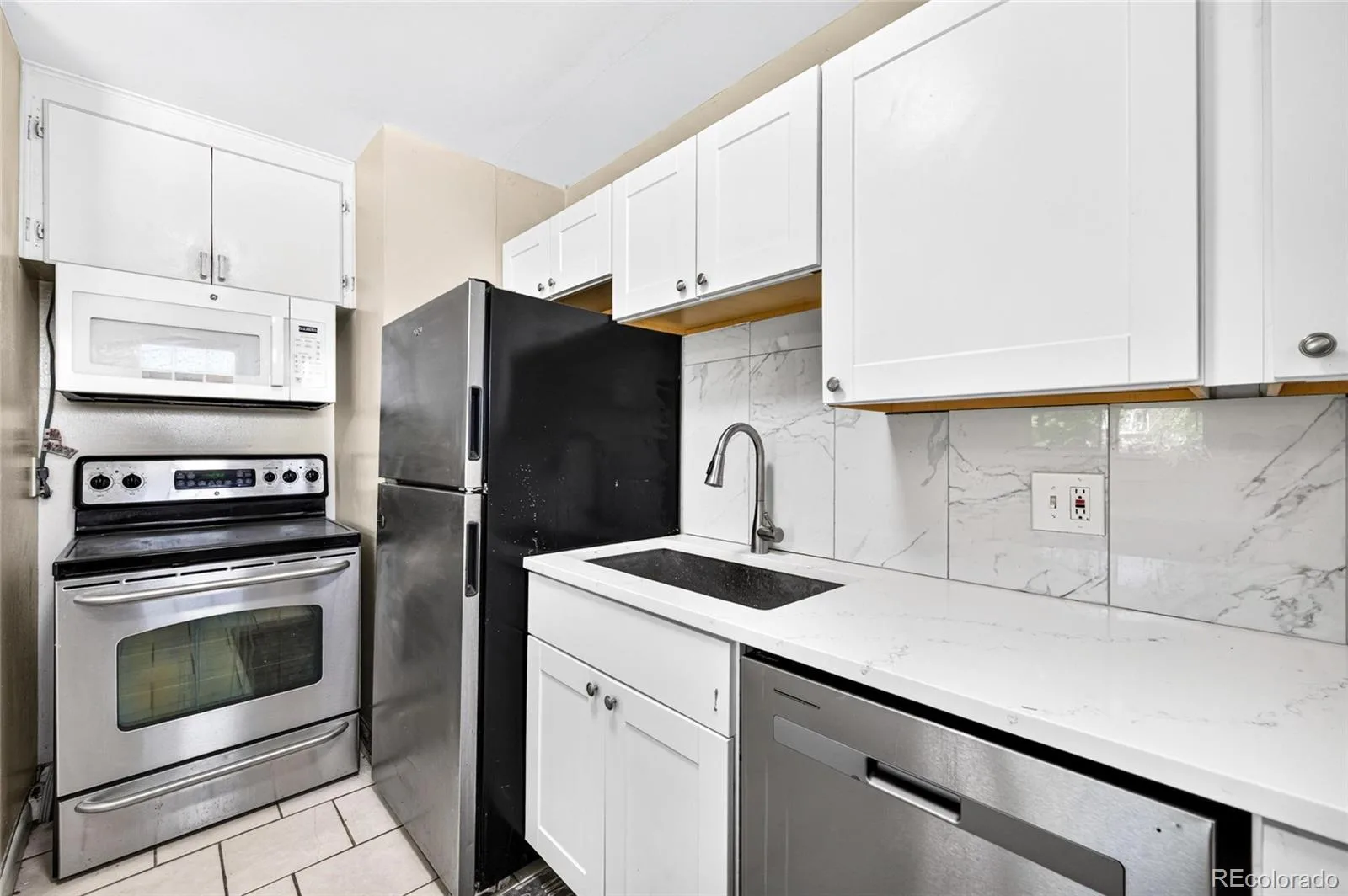 13080 E 13th Place Aurora CO 80011 | MLS #REC6278866 08142026194041 1600 12