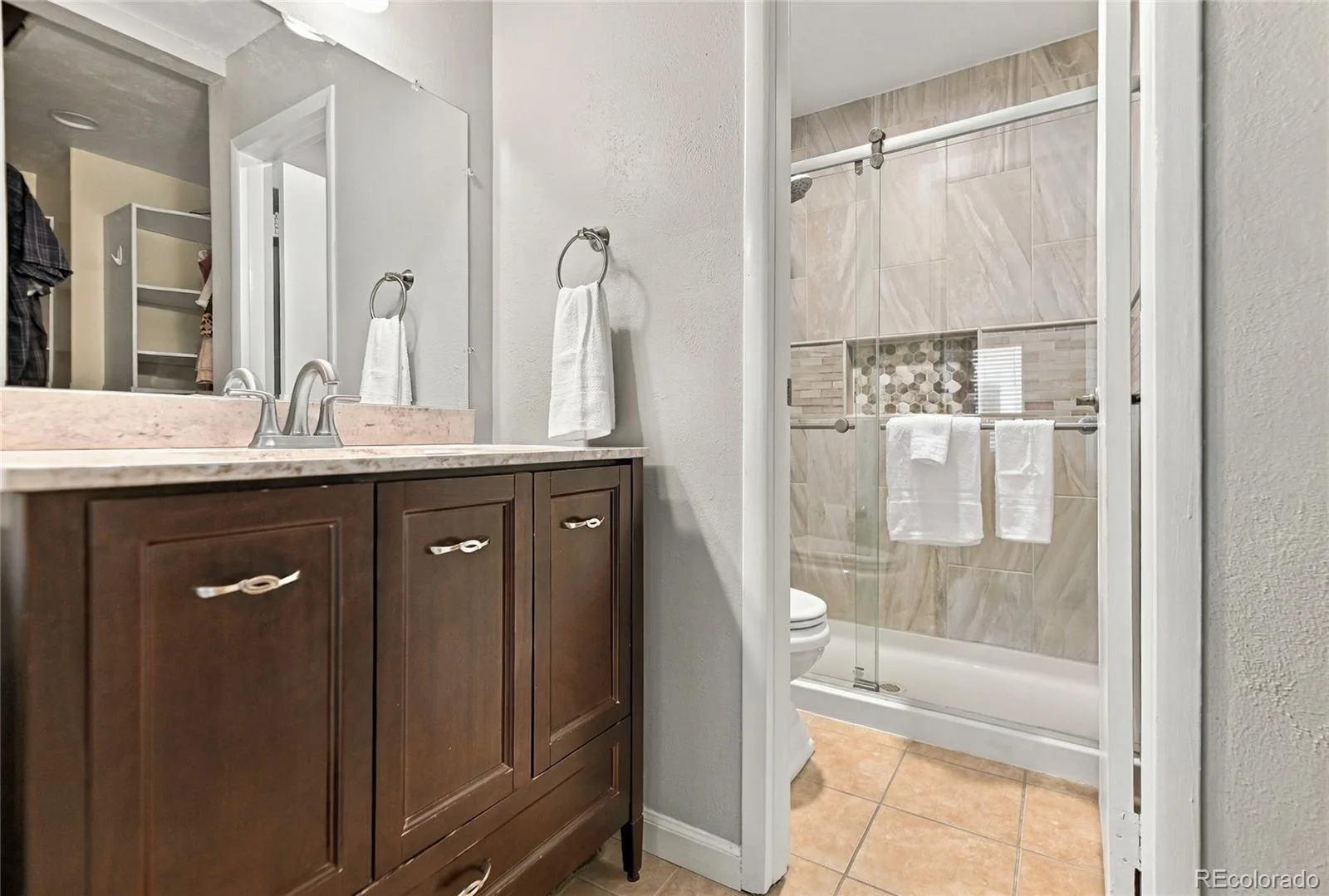 1050 S Monaco Street Parkway #103 Denver CO 80224 | MLS #REC6347760 10122026210138 1600 18