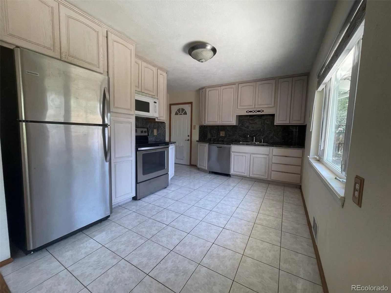 3100 S Mabry Way Denver CO 80236 | MLS #REC6381900 07292026185707 1600 3