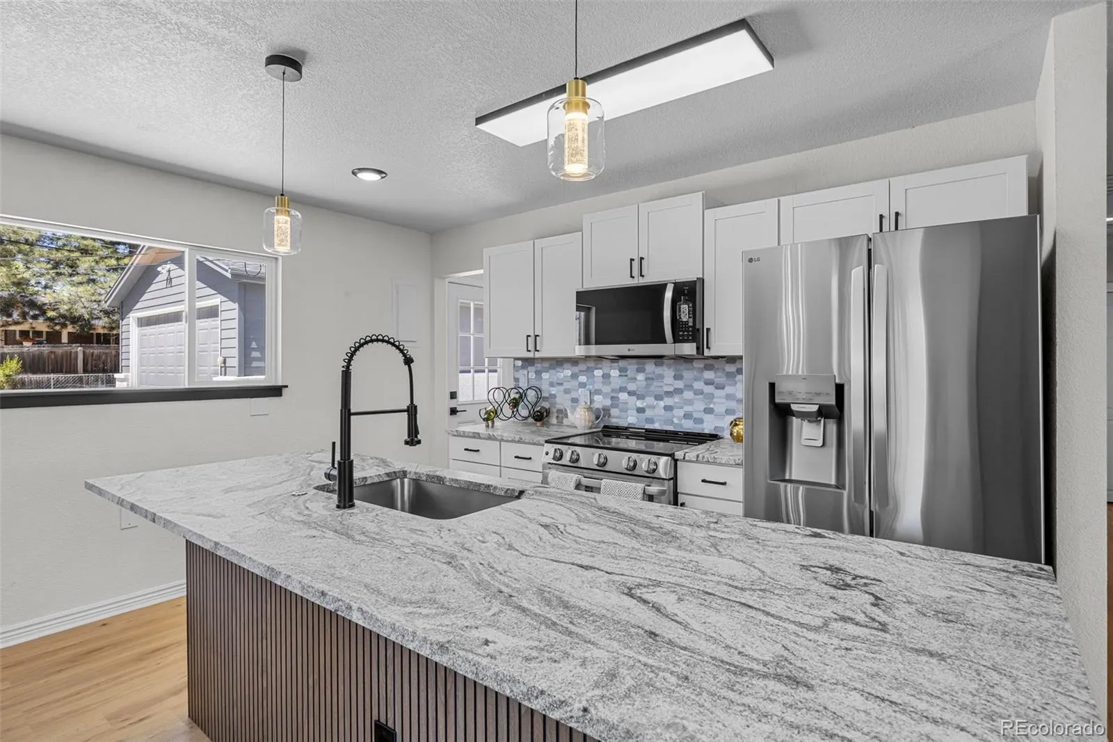 6411 Marshall Arvada CO 80003 MLS #REC6413941 05052026041622 1600 12