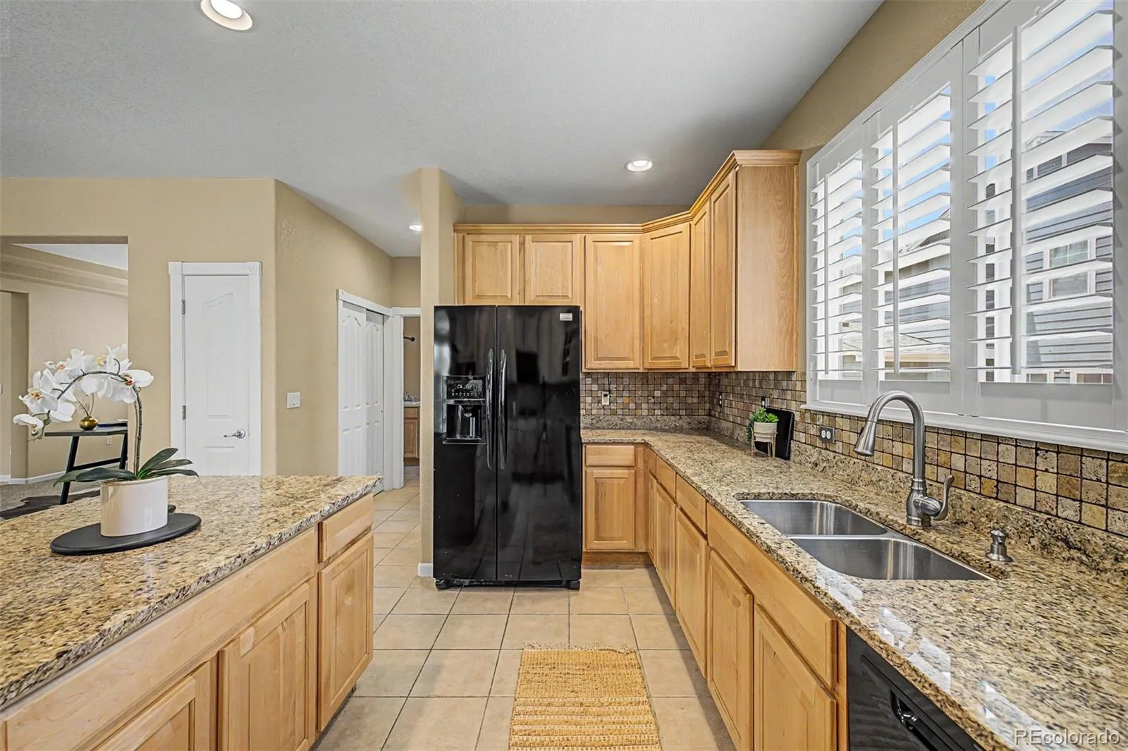 7318 S Millbrook Street Aurora CO 80016 | MLS #REC6439958 08052026143737 1600 18