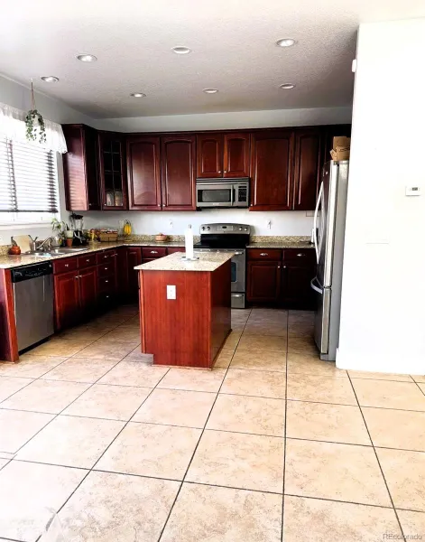 9826 Nucla Street Commerce City CO 80022 | MLS #REC6480200 04102026174657 800 3