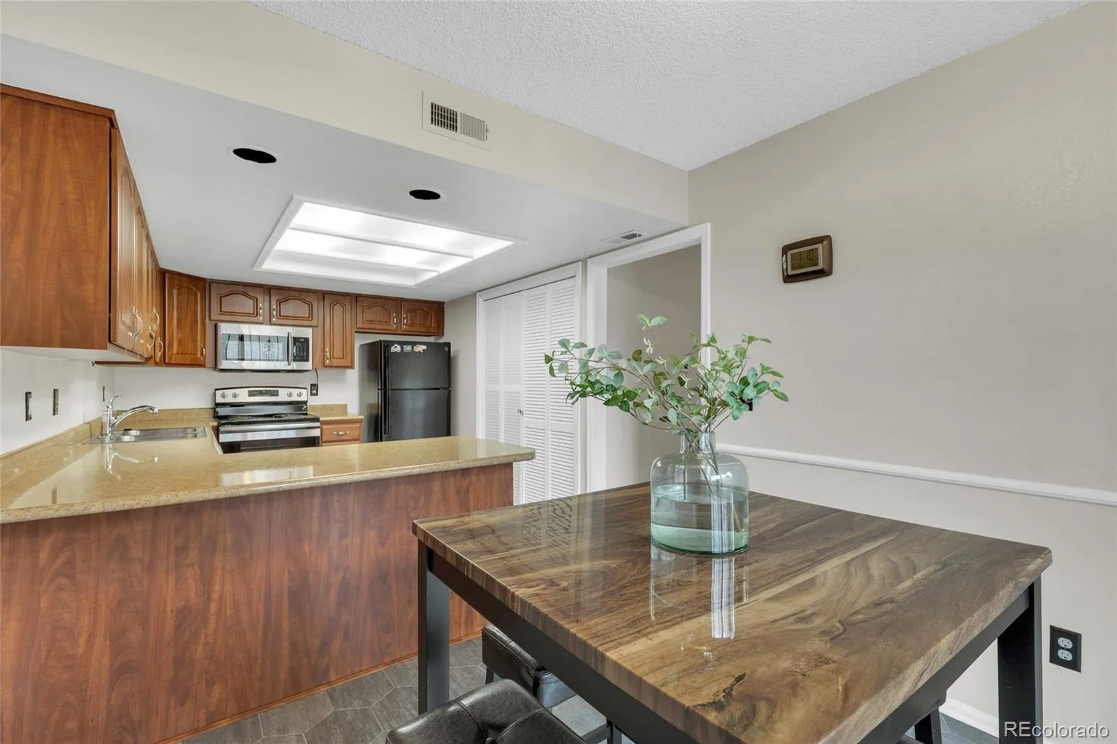 1350 S Idalia Street #D Aurora CO 80017 MLS #REC6636950 05012026172829 1600 13