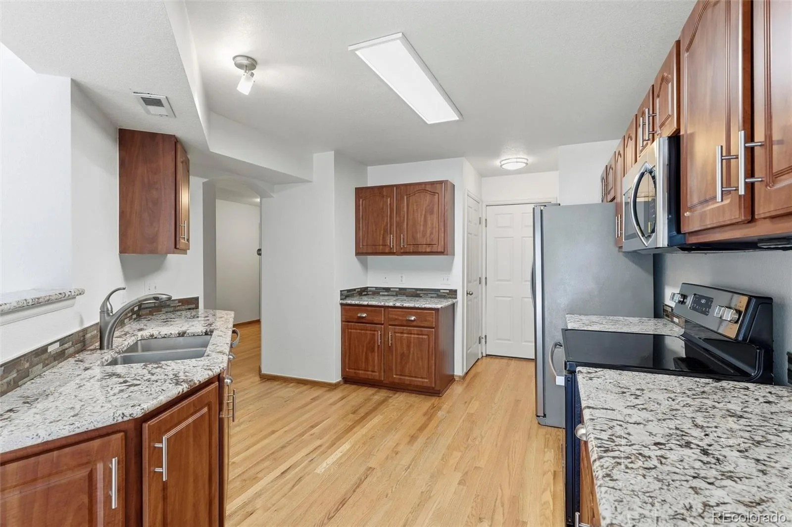19174 E Wyoming Drive #103 Aurora CO 80017 | MLS #REC6645012 08122026042517 1600 10