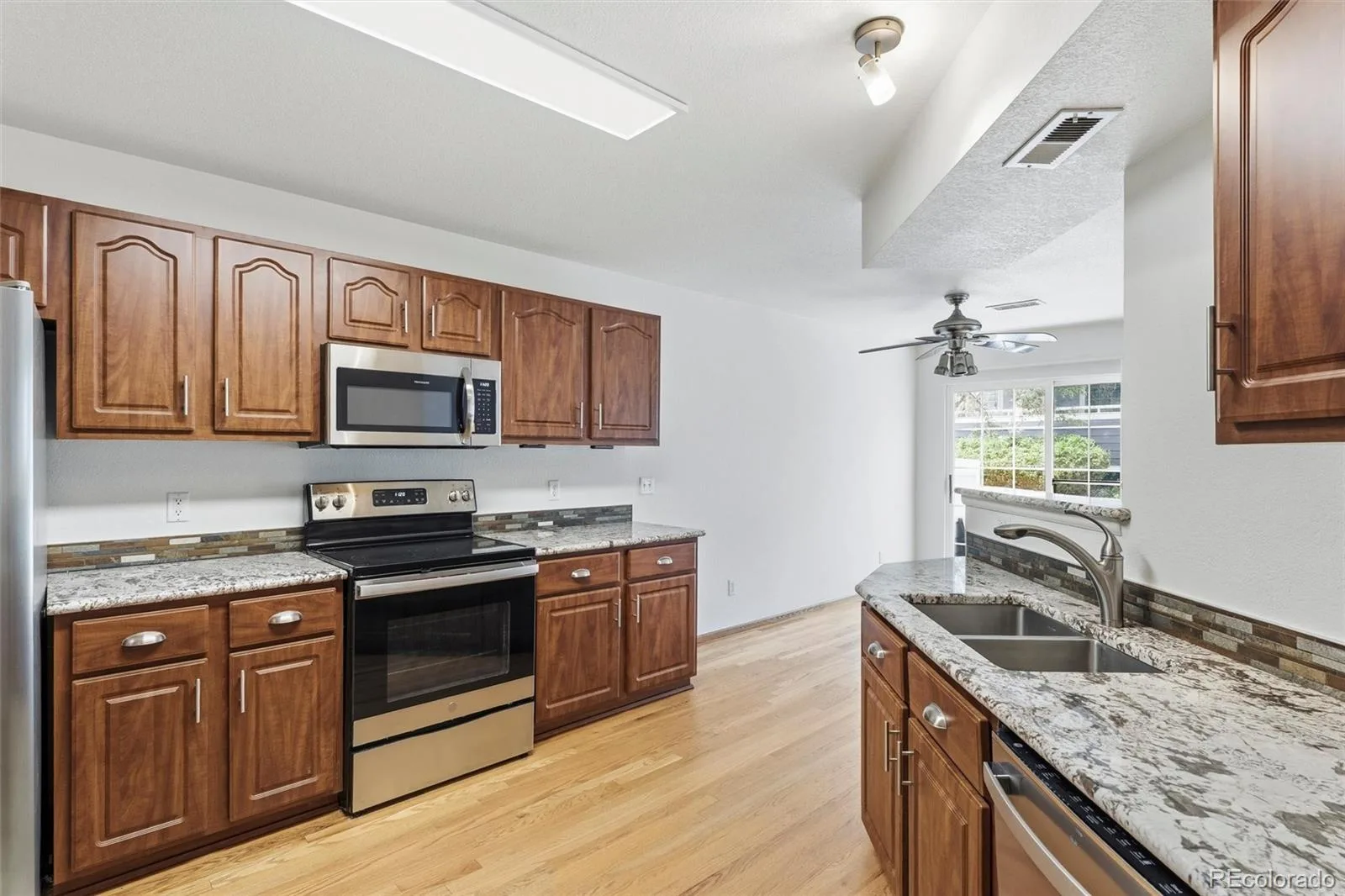 19174 E Wyoming Drive #103 Aurora CO 80017 | MLS #REC6645012 08122026042517 1600 8