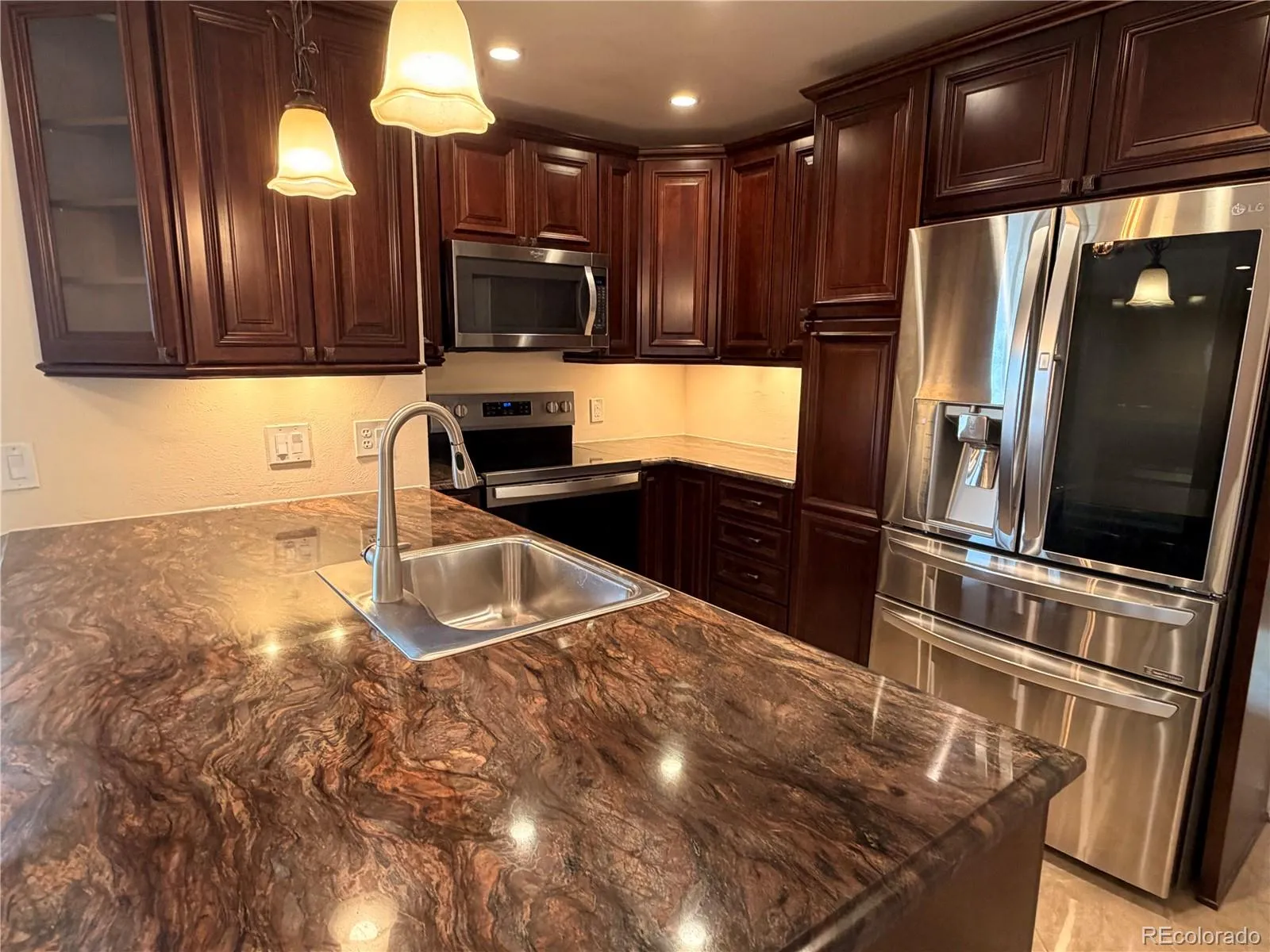 8654 E Eastman Avenue Denver CO 80231 MLS #REC6647301 05212026042129 1600 14