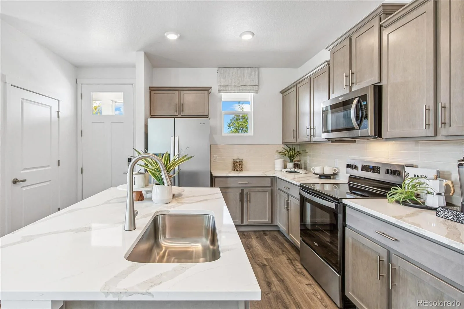 1410 S Boston Court #B Denver CO 80247 | MLS #REC6692396 08192026184338 1600 2