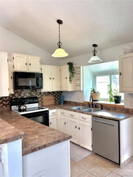 9610 W Chatfield Avenue #F Littleton CO 80128 | MLS #REC6705200 08212026034557 800 5