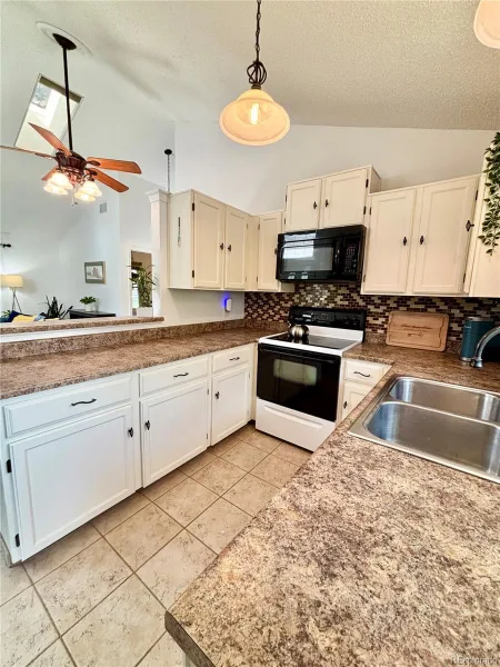 9610 W Chatfield Avenue #F Littleton CO 80128 | MLS #REC6705200 08212026034557 800 7