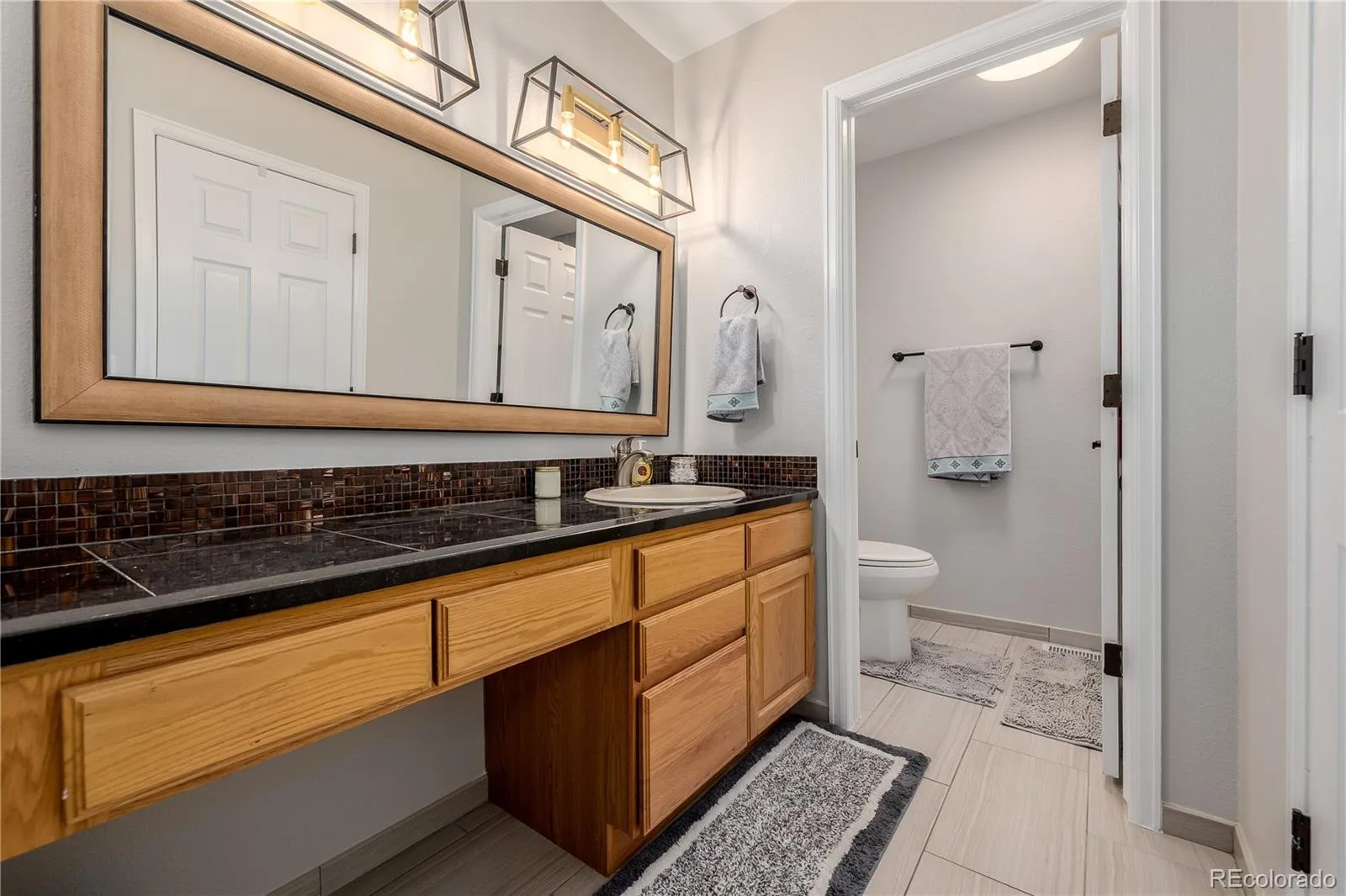 7831 Sangre De Cristo Littleton CO 80127 | MLS #REC6706407 08102026185634 1600 26