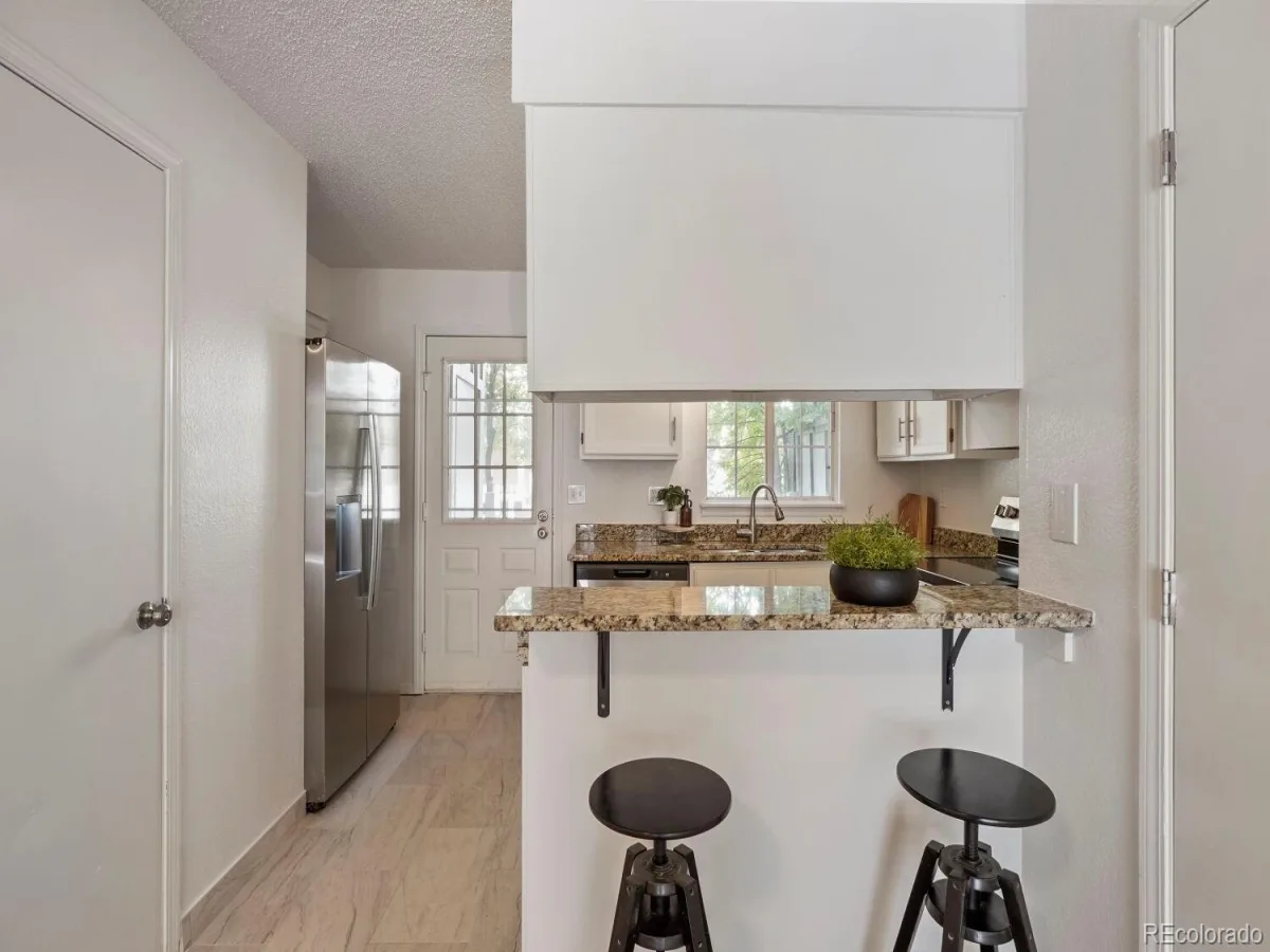 12063 E Hoye Drive Aurora CO 80012 | MLS #REC6709985 10022026165347 1200 9