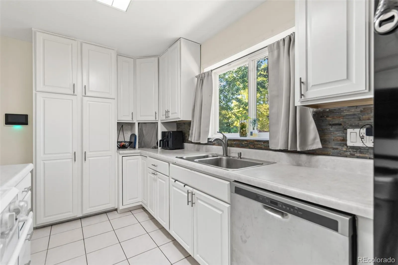 3397 W Tanforan Drive Englewood CO 80110 MLS #REC6738863 05032026000923 1600 14