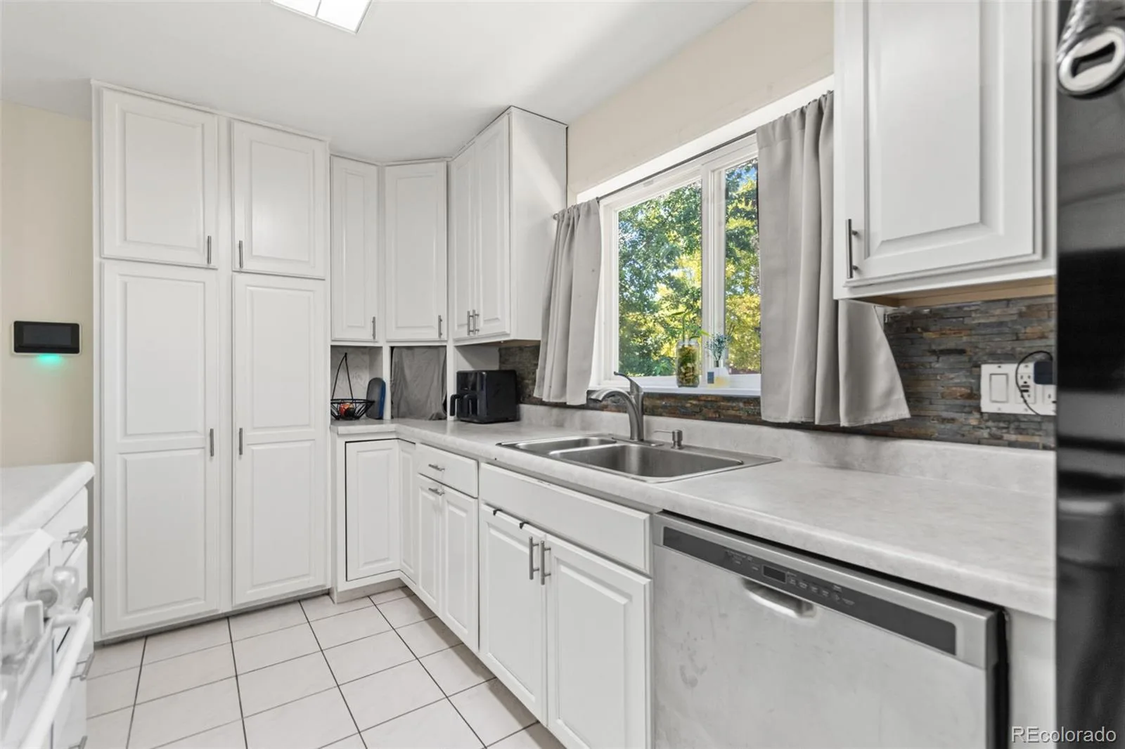 3397 W Tanforan Drive Englewood CO 80110 | MLS #REC6738863 08202026161814 1600 14