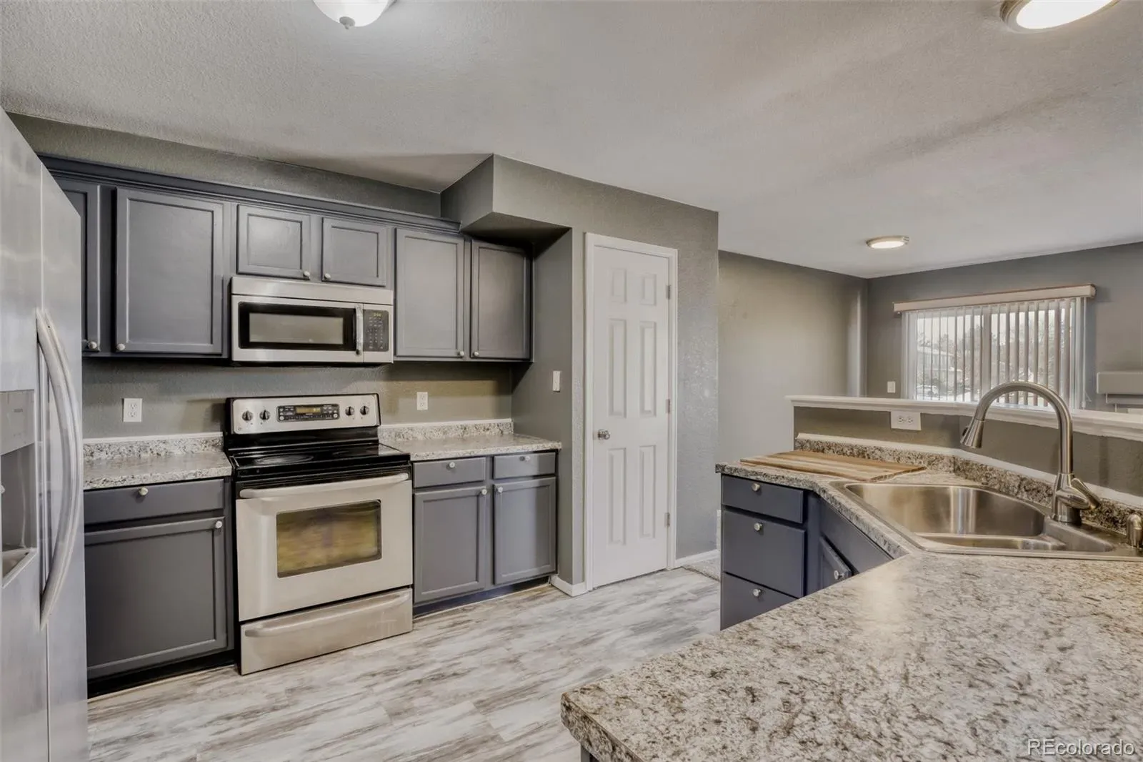 1179 S Waco Street #E Aurora CO 80017 MLS #REC6823373 03302026182459 1600 12