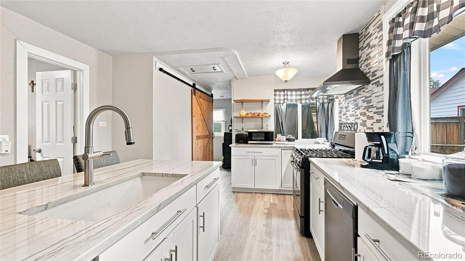 2430 W Iliff Avenue Denver CO 80219 | MLS #REC6829004 08272026160917 1600 10
