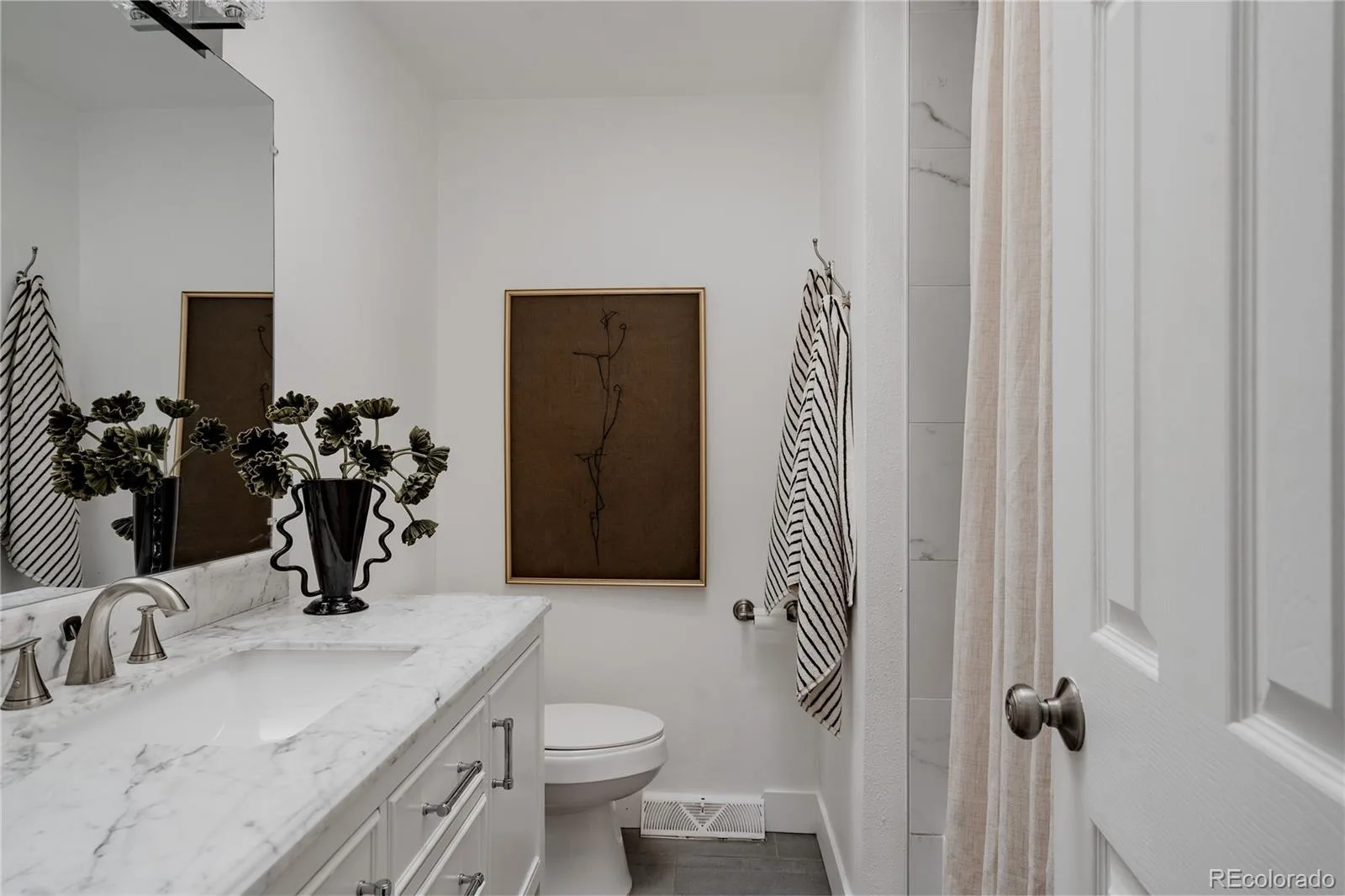563 Jamaica Street Aurora CO 80010 | MLS #REC6834678 08122026181703 1600 18