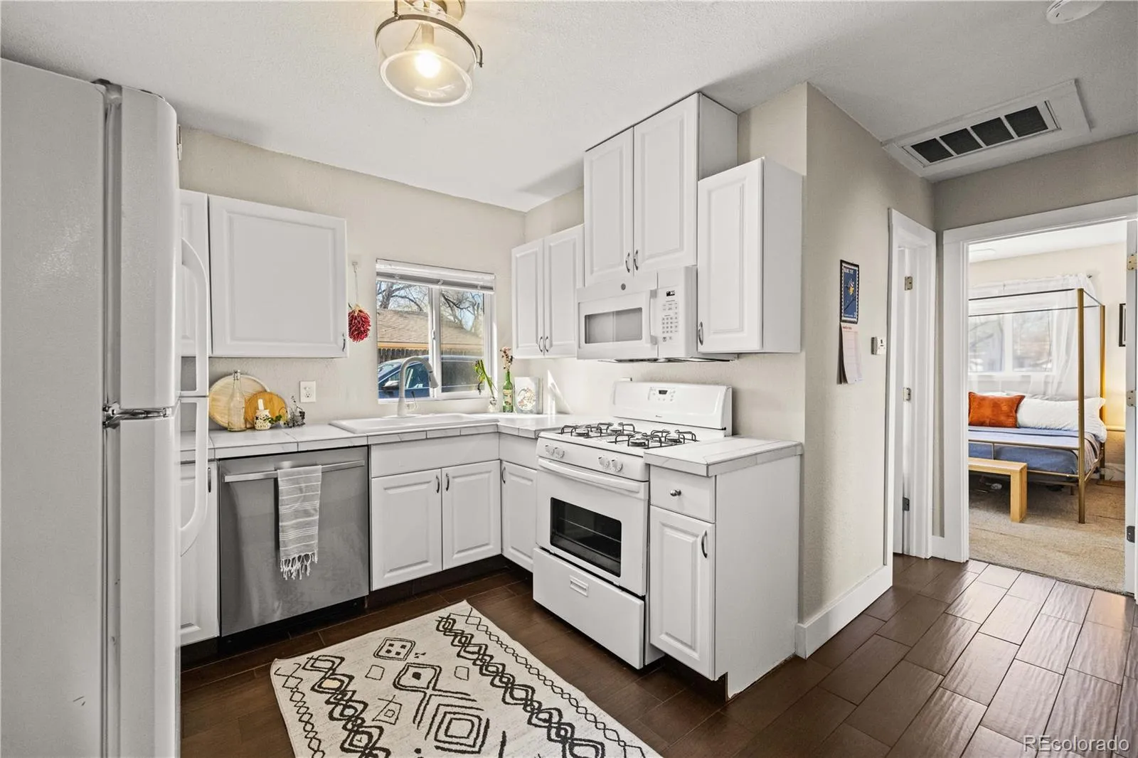 4394 W Center Avenue Denver CO 80219 MLS #REC6847287 05012026010642 1600 11