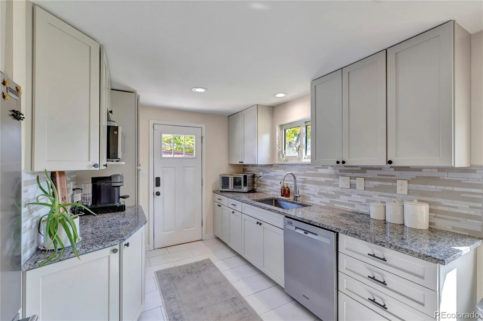 3945 S Inca Street Englewood CO 80110 | MLS #REC6891104 08122026190308 1600 6