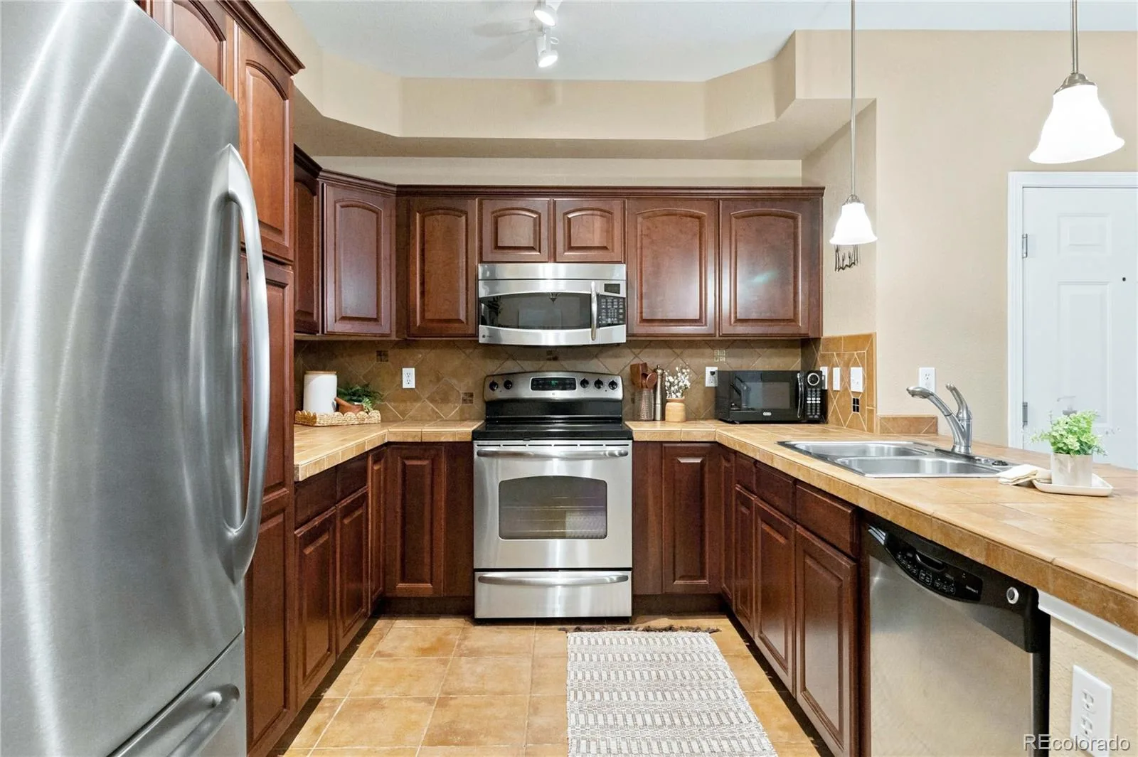 10052 W Ute Place #102 Littleton CO 80127 | MLS #REC6925626 08312026164346 1600 10