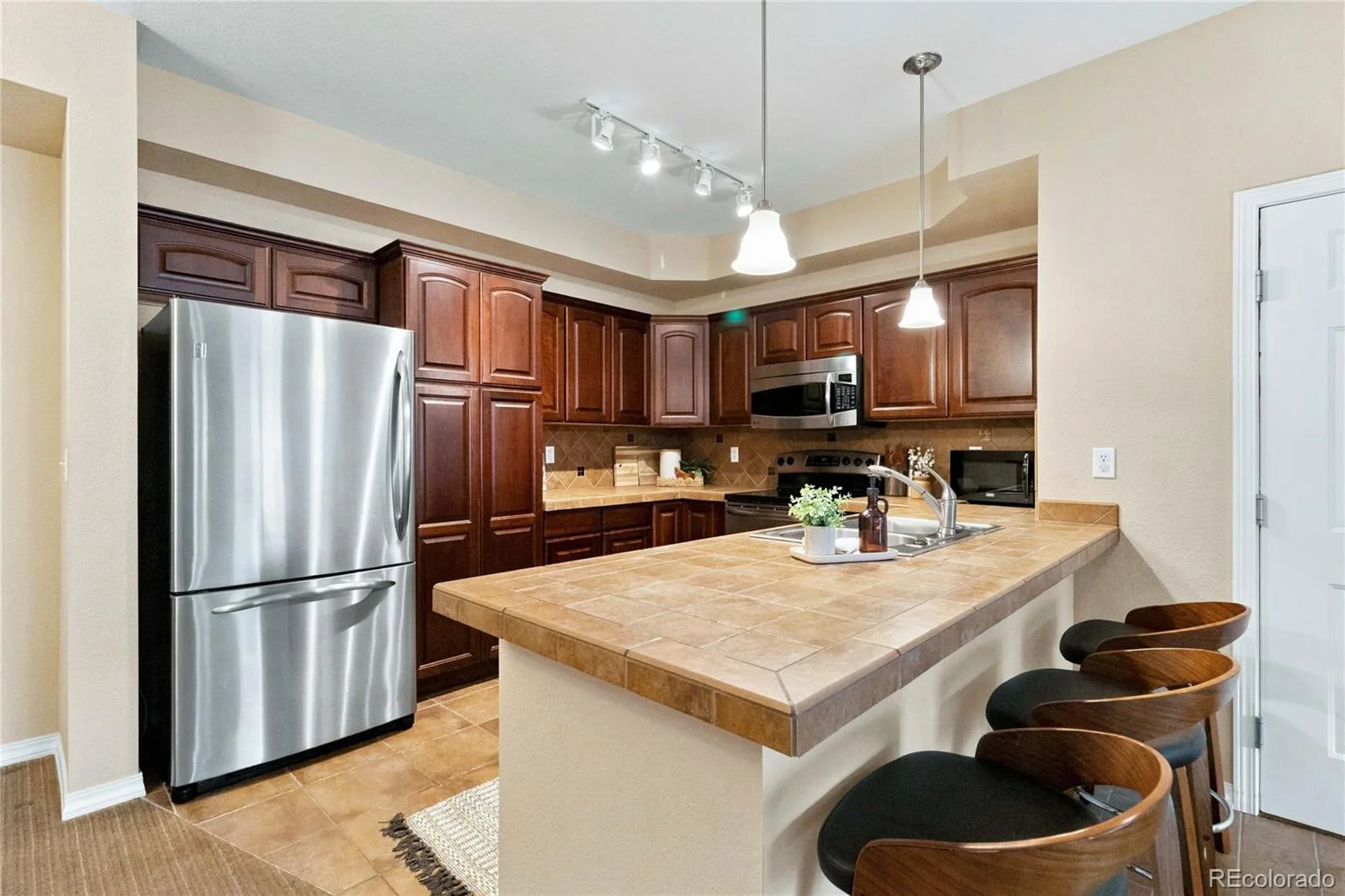 10052 W Ute Place #102 Littleton CO 80127 | MLS #REC6925626 08312026164346 1600 7