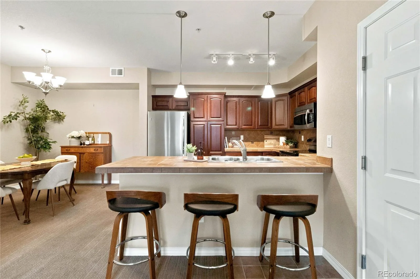 10052 W Ute Place #102 Littleton CO 80127 | MLS #REC6925626 08312026164346 1600 9