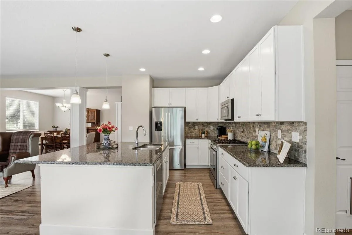 22038 E Stroll Avenue Parker CO 80138 | MLS #REC6929617 07192026190914 1200 12