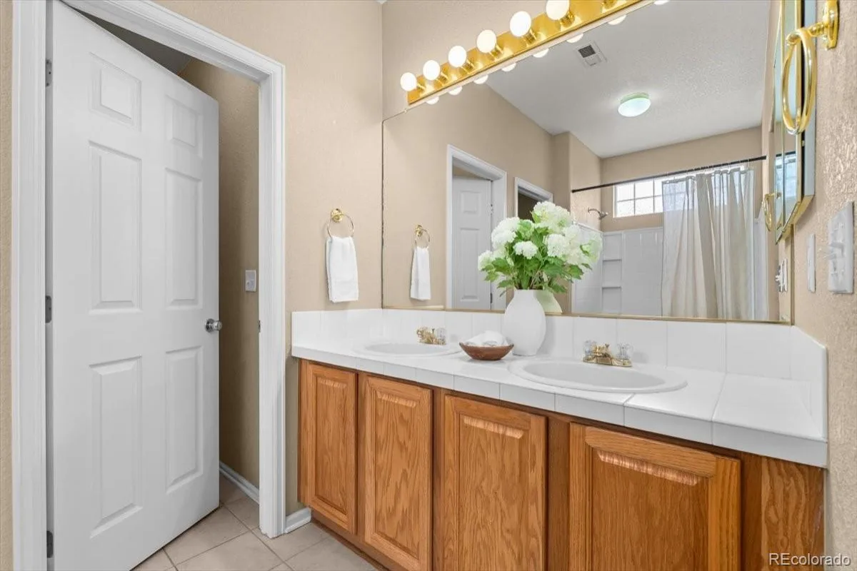 15553 E 96th Way Commerce City CO 80022 | MLS #REC6965548 08282026144611 1200 13