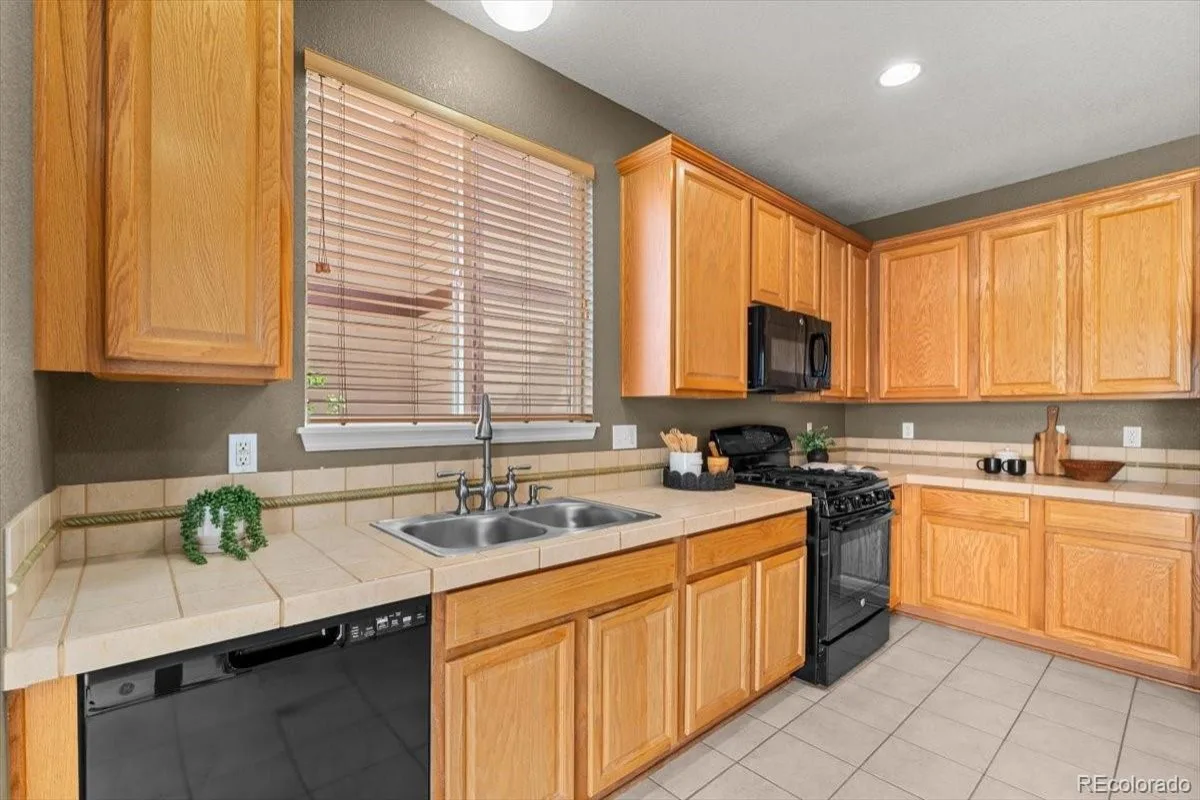15553 E 96th Way Commerce City CO 80022 | MLS #REC6965548 08282026144611 1200 5