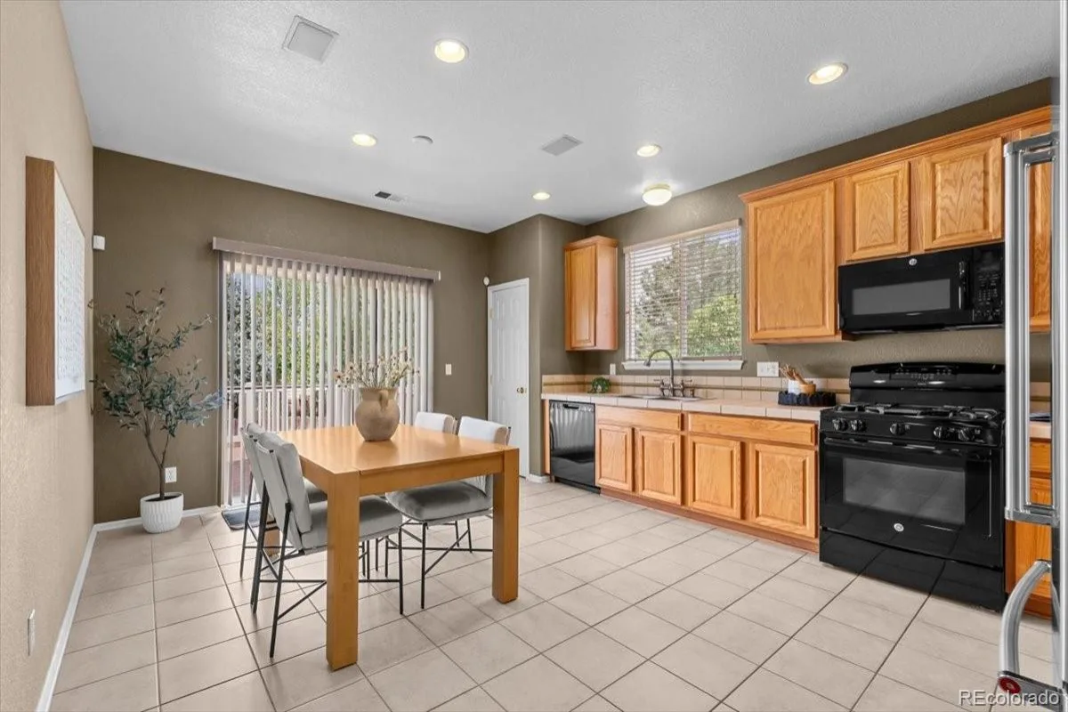 15553 E 96th Way Commerce City CO 80022 | MLS #REC6965548 08282026144611 1200 6