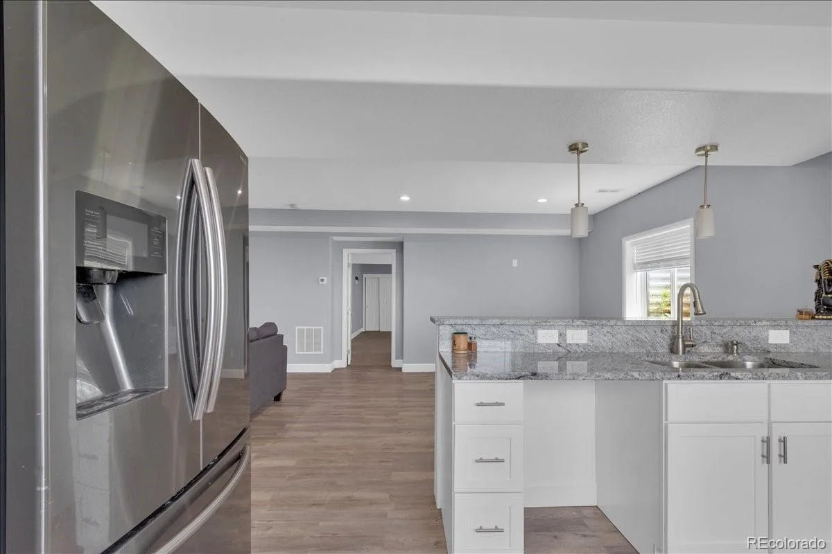 413 N De Gaulle Court Aurora CO 80018 | MLS #REC6984493 08062026161127 1200 22
