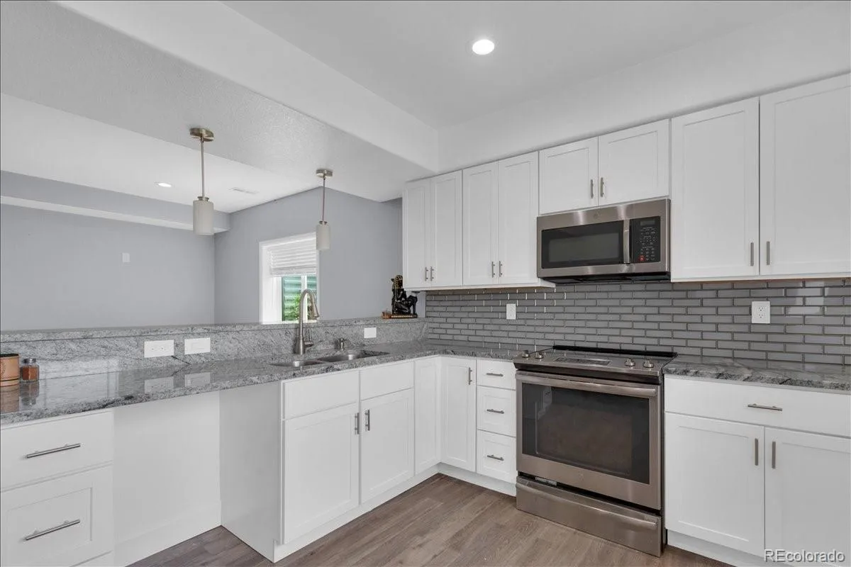 413 N De Gaulle Court Aurora CO 80018 | MLS #REC6984493 08062026161127 1200 23